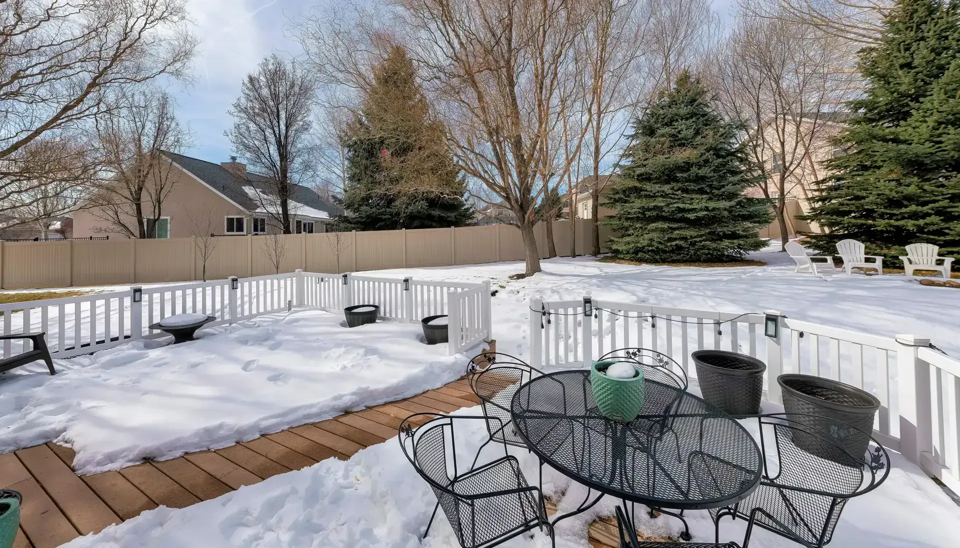backyard patio covered in snow