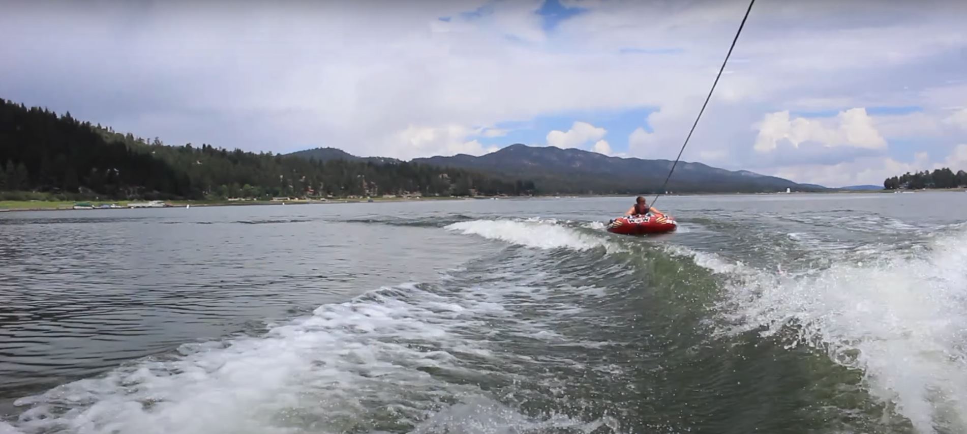 Boy tubing in Big Bear Lake CA