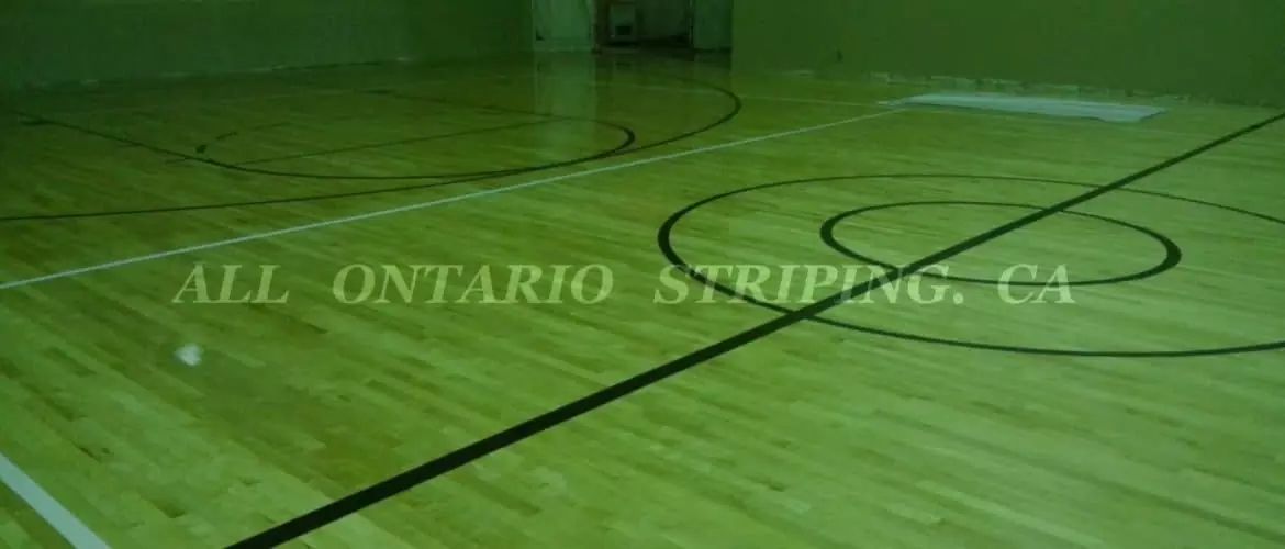 freshly painted lines on a basketball court