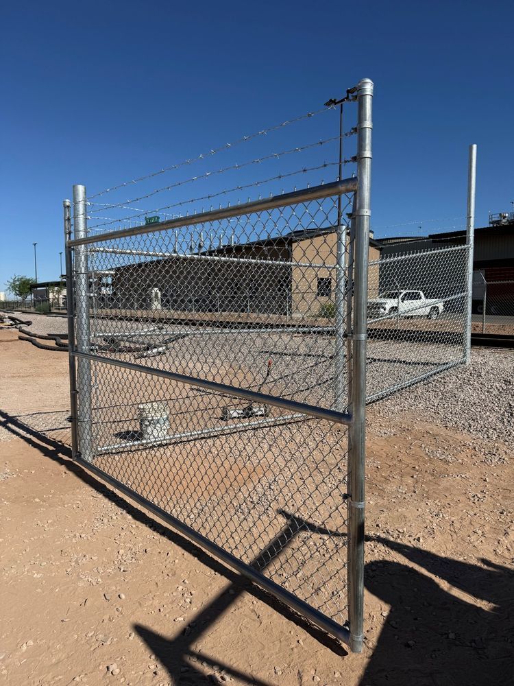 Commercial fencing securing a working property in Maricopa