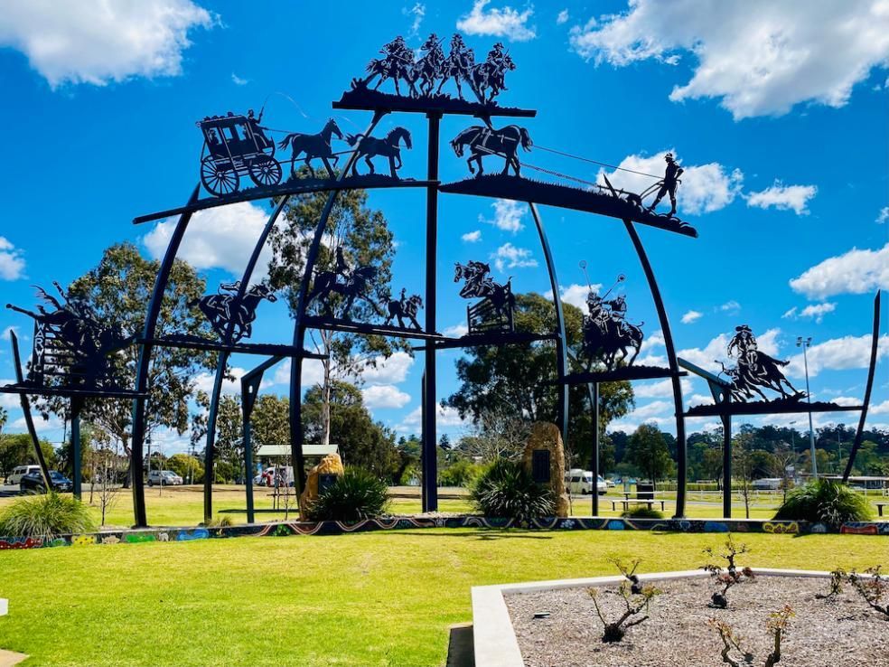 A Large Sculpture Of Horses Pulling A Carriage In A Park โ Stand Fast Electrical Pty Ltd in Warwick, QLD