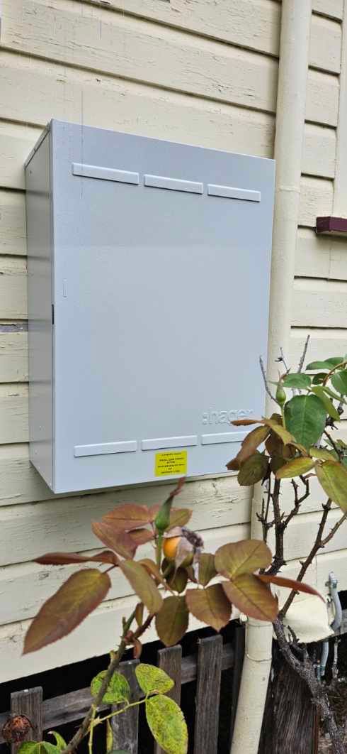 White Air Conditioner Sitting On A Brick โ Stand Fast Electrical Pty Ltd in Warwick, QLD