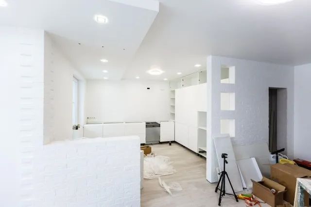 Newly finished white interior room undergoing renovation after professional drywall service in Moreno Valley, CA.