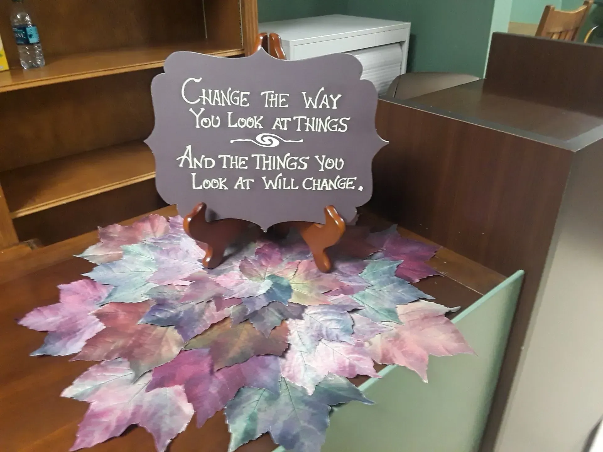 A sign that says change the way you look at things