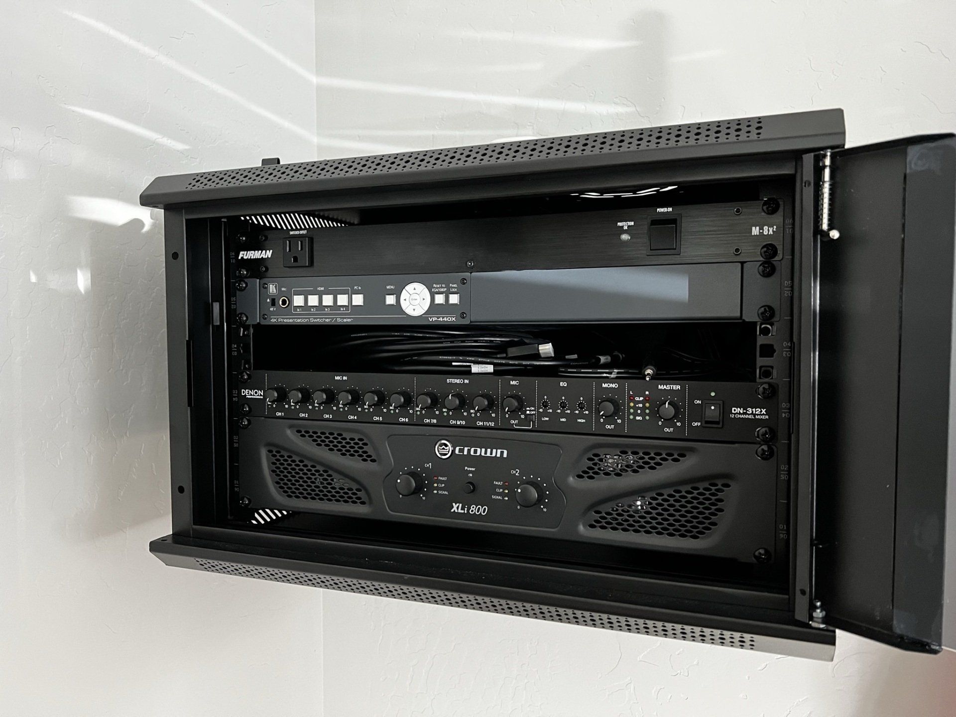A black box with a bunch of electronics inside of it