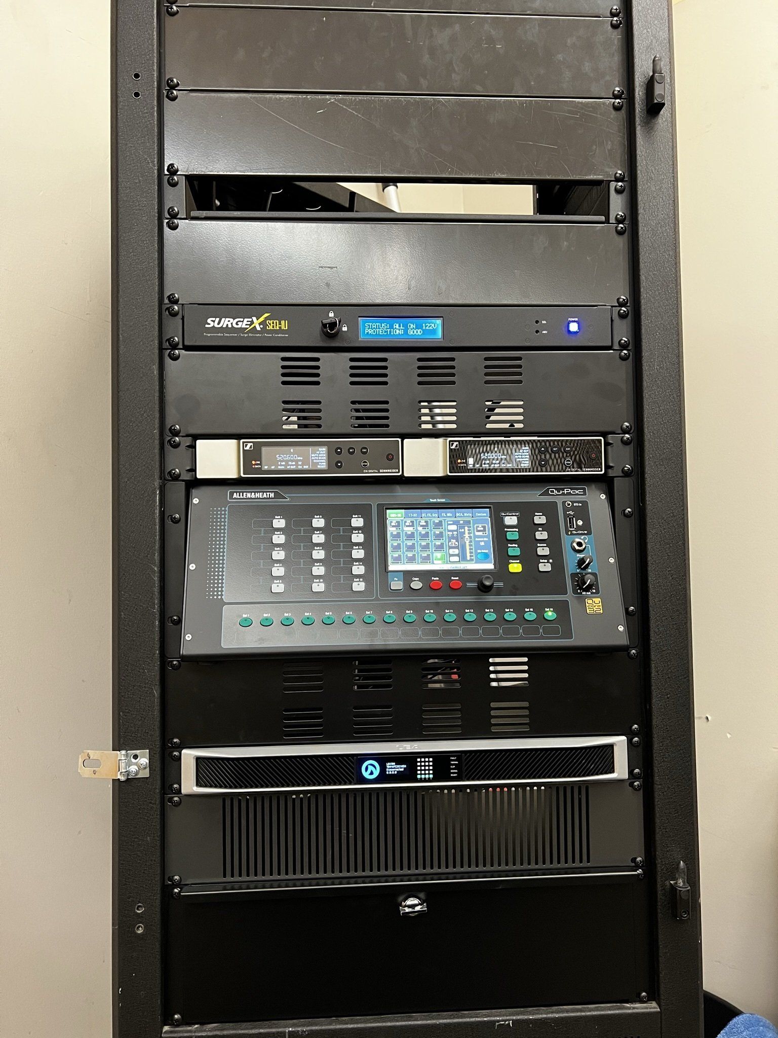 A rack of electrical equipment with the word ash on it