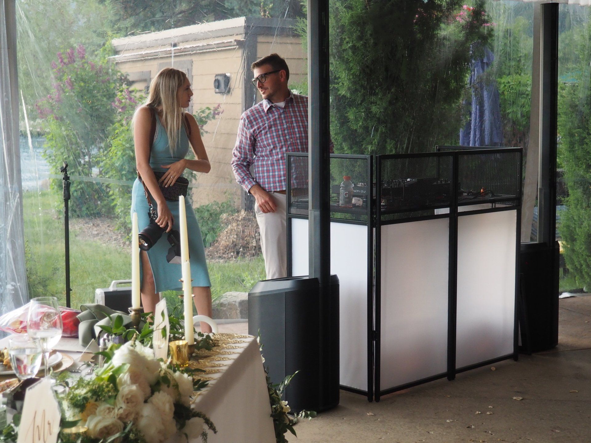 A man and a woman are standing next to each other in a room.