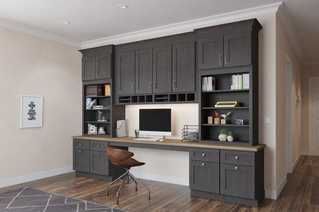 AD Construction NJ - Dark gray home office with desk, cabinets, shelves, and a computer.