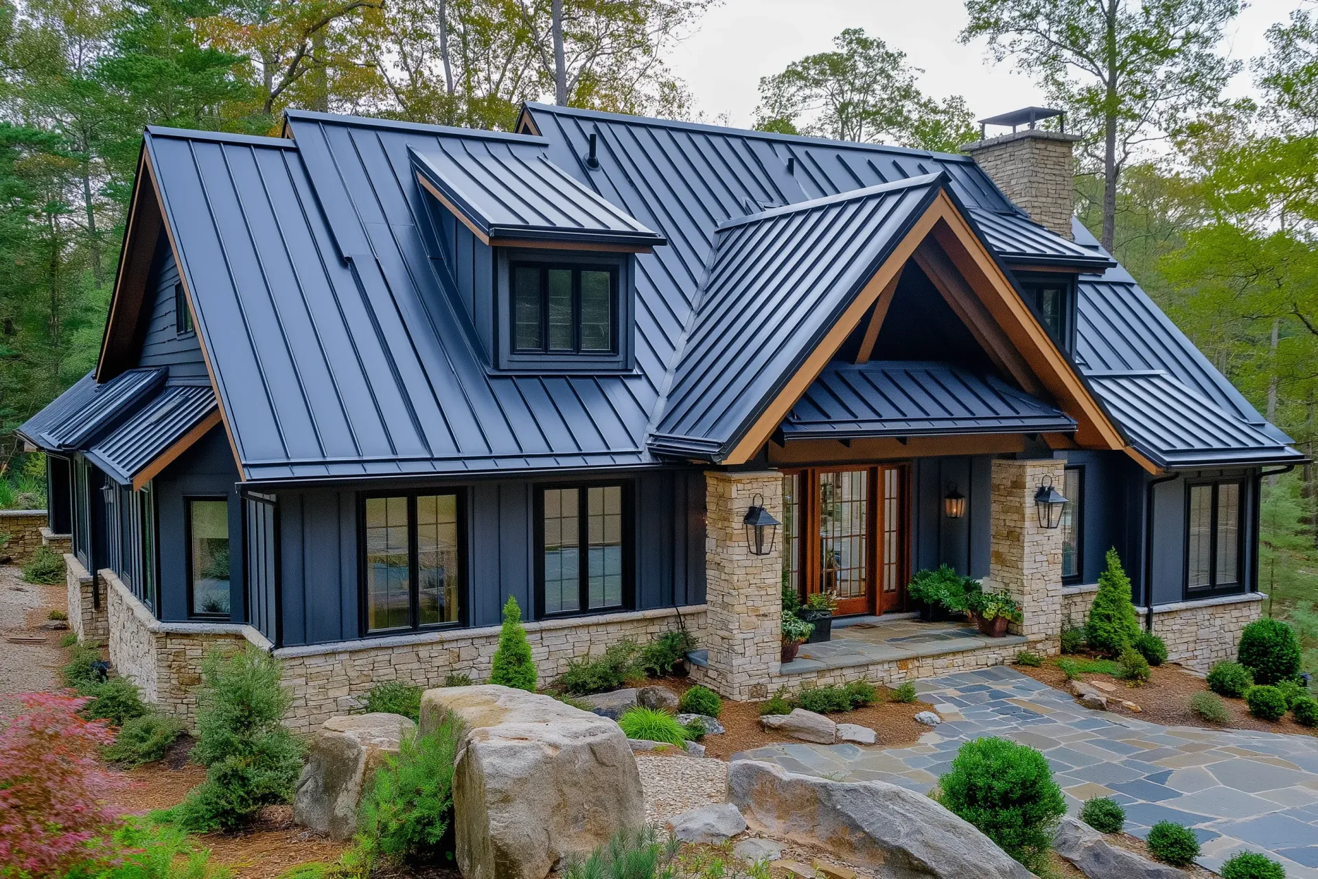 AD Construction NJ - Cabin home with dark blue metal roof, stone facade, and wooden accents, set in a wooded area.
