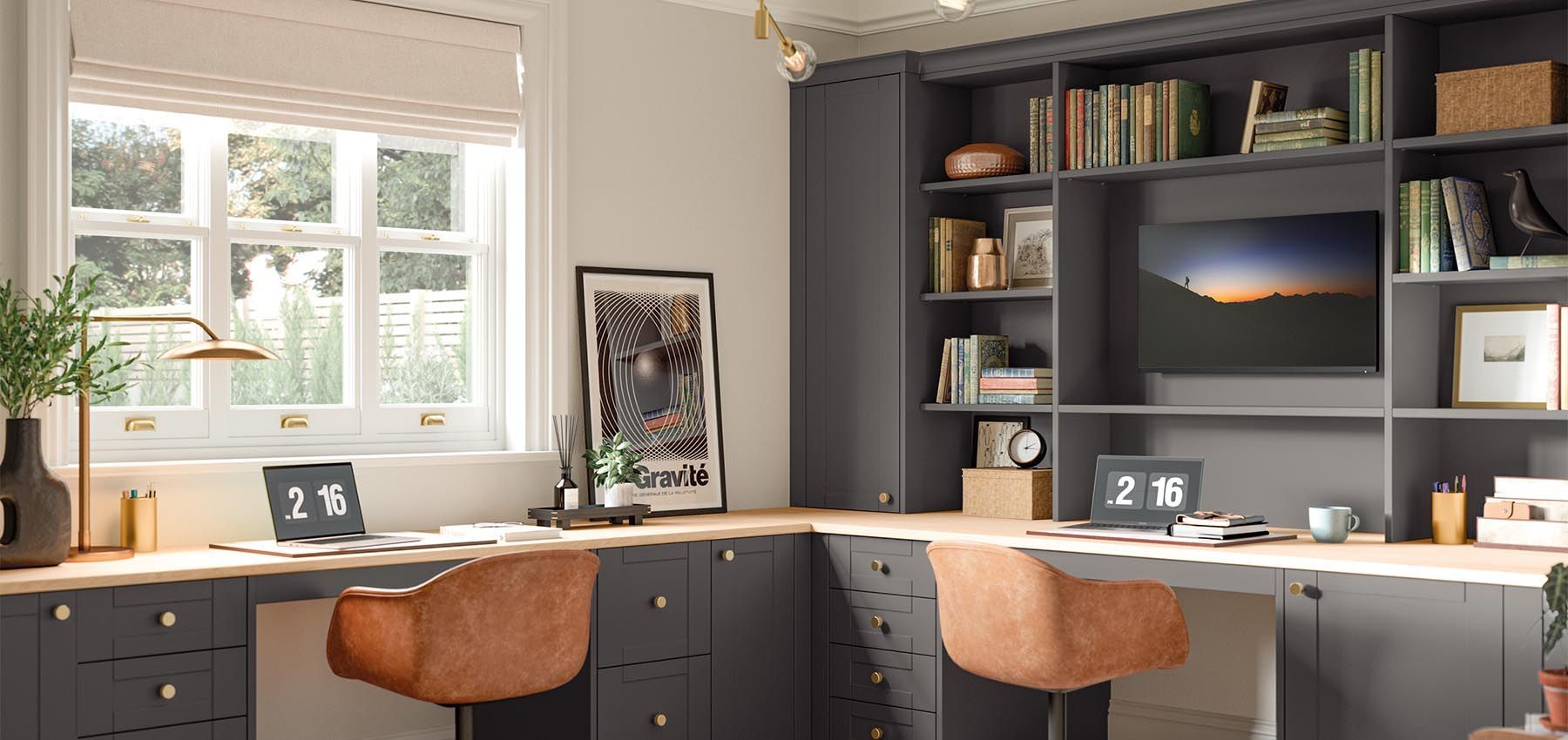 AD Construction NJ - A home office with a built-in desk, bookshelves, two laptops, and two leather chairs.
