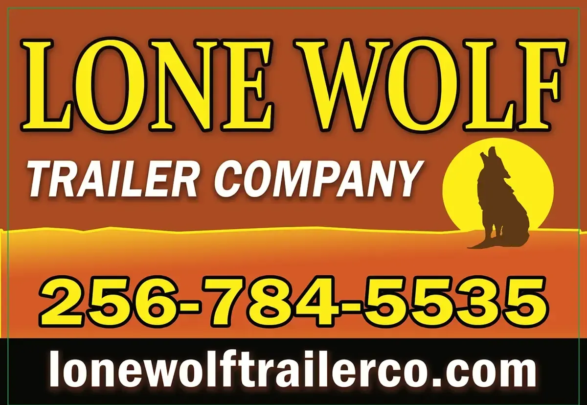 Lone Wolf Trailer Company sign with phone number 256-784-5535 and website lonewolftrailerco.com