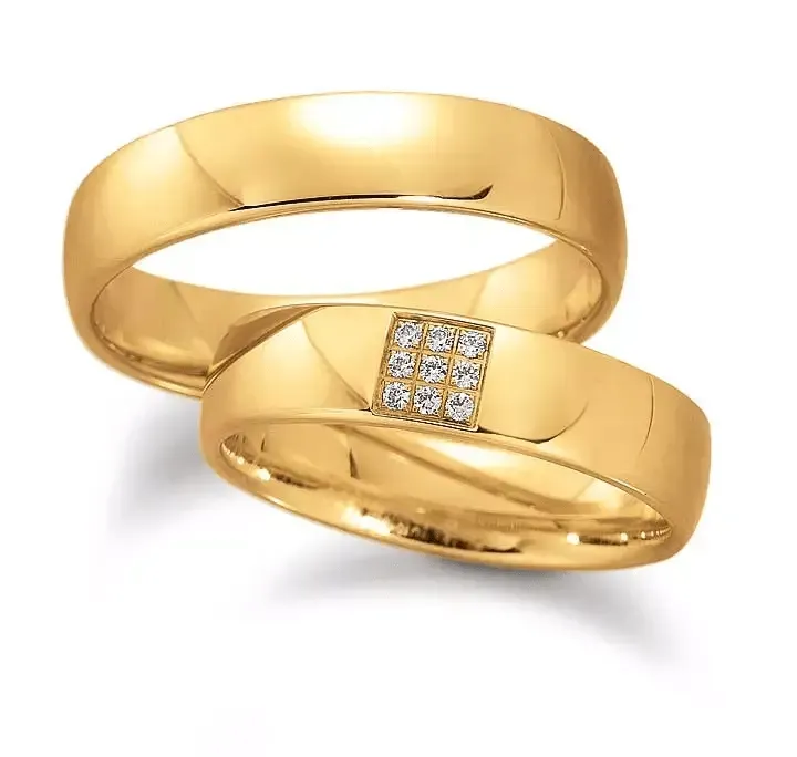 Geelgouden damesring 5.5mm breed met 9 brillant 0,045CT en herenring 5.5mm