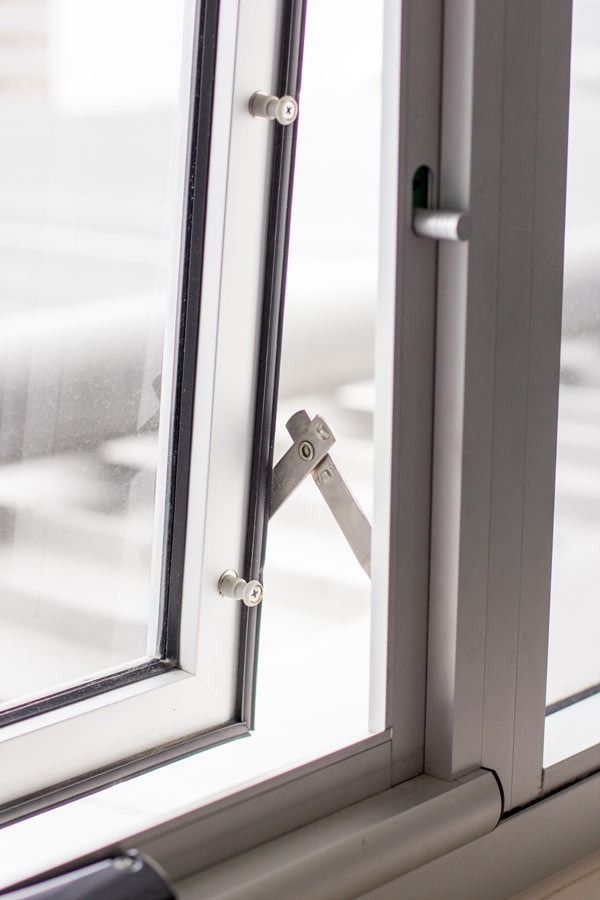 A Close Up Of A Window With A Lock On It — Datco Aluminium Pty Ltd In Grafton, NSW
