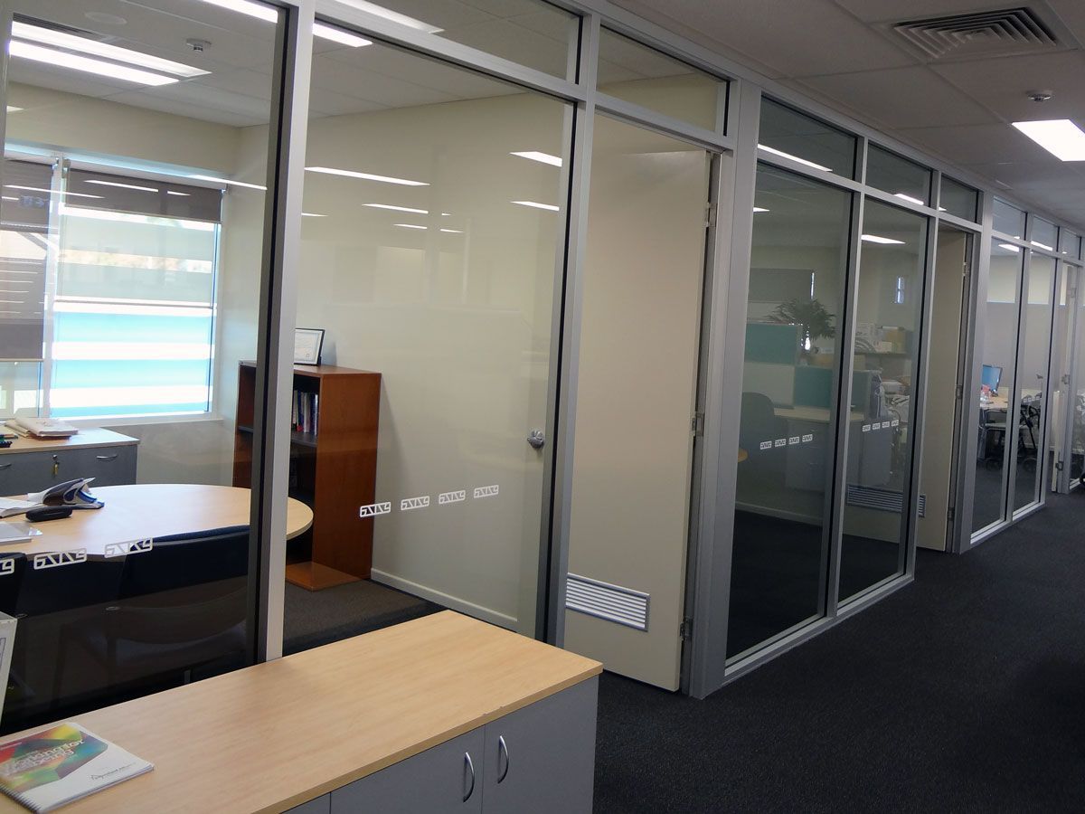 An Office With a Lot of Glass Walls and Doors — Datco Aluminium Pty Ltd In Murwillumbah, NSW