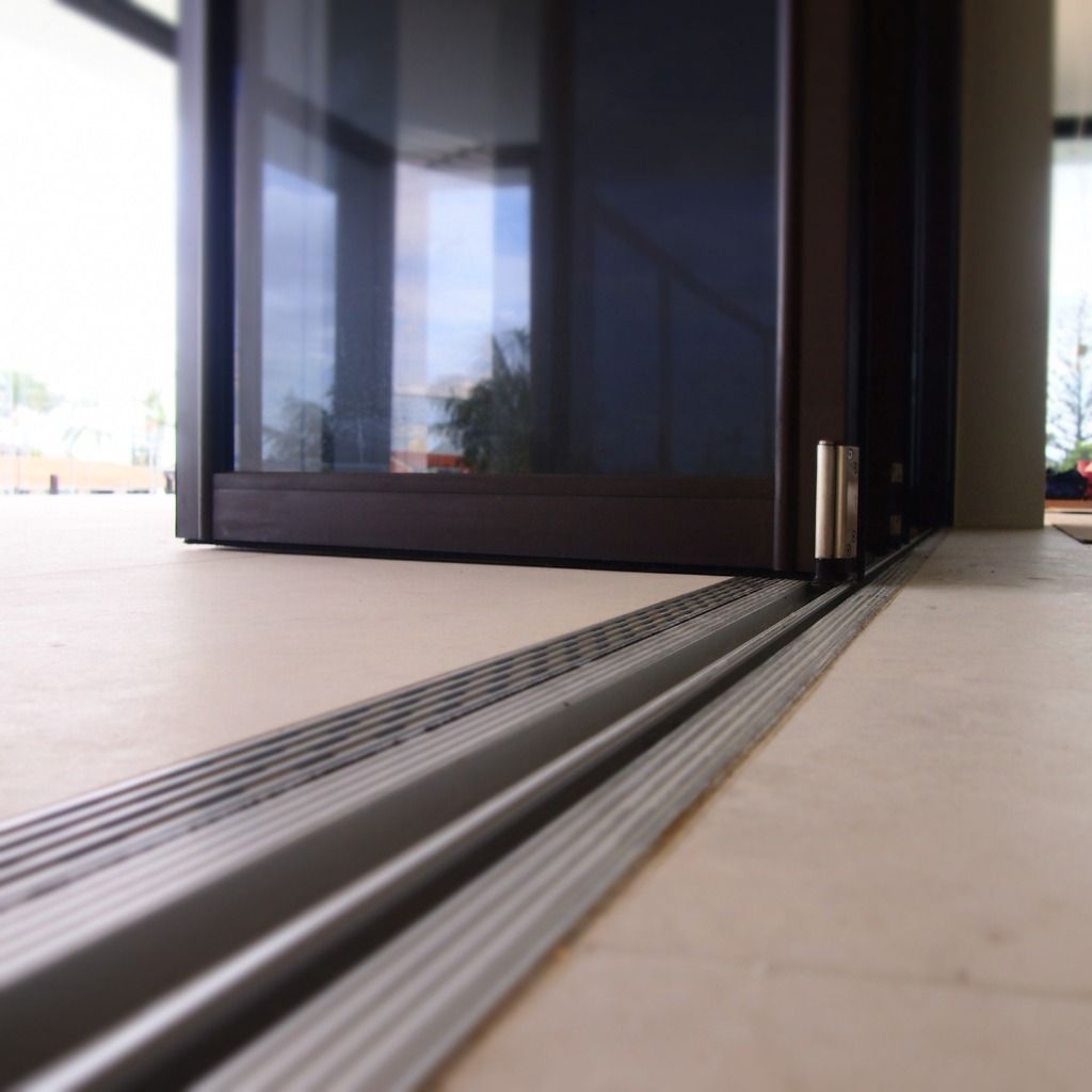 A Close Up Of A Sliding Glass Door — Datco Aluminium Pty Ltd In Murwillumbah, NSW