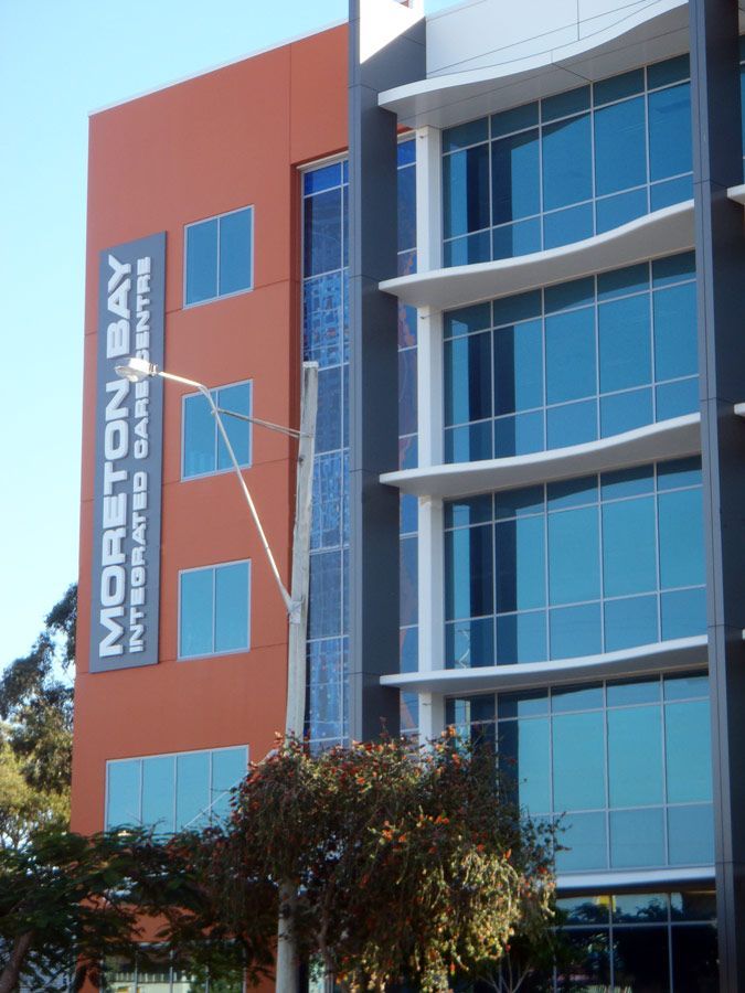 A Building With a Sign That Says Moreton Bay — Datco Aluminium Pty Ltd In Murwillumbah, NSW