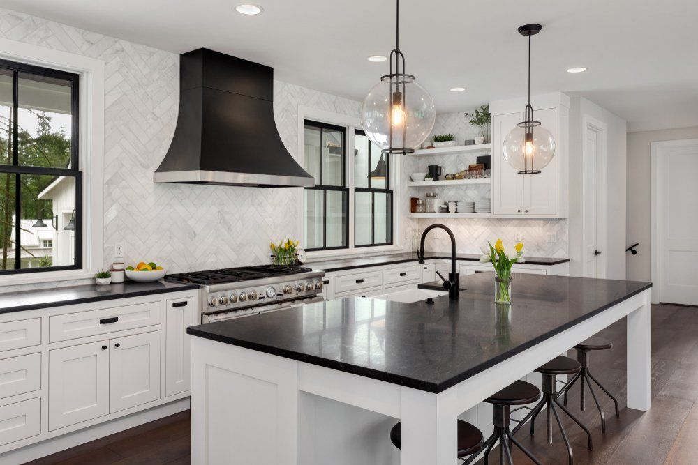 Renovated White and Black Kitchen — Builders in Salt Ash, NSW