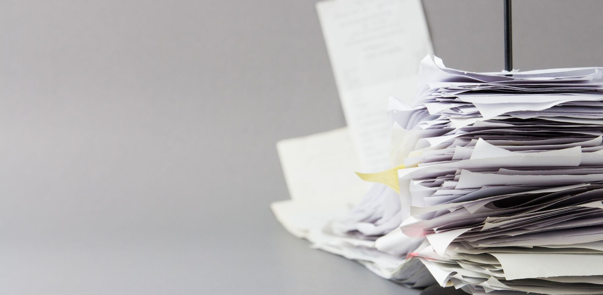 receipts stacked on table