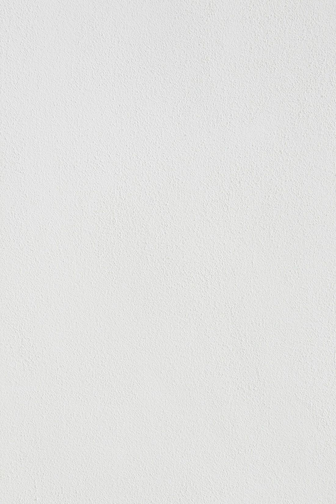 A close up of a white paper texture.
