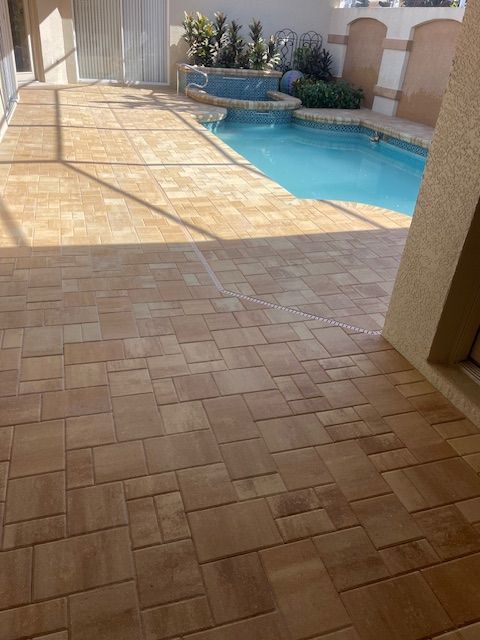 Flagstone's City Stone Demi Pavers in Cream/Beige Pool Deck with Coordinating Cream/Beige Coping