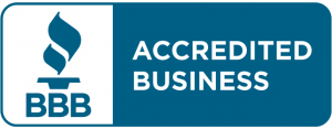 A blue sign that says accredited business on it