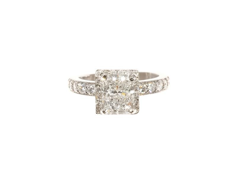 Square diamond ring with pavé band on a white background