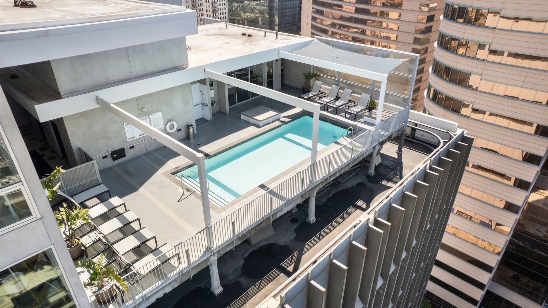 overhead view of pool with lounge chairs