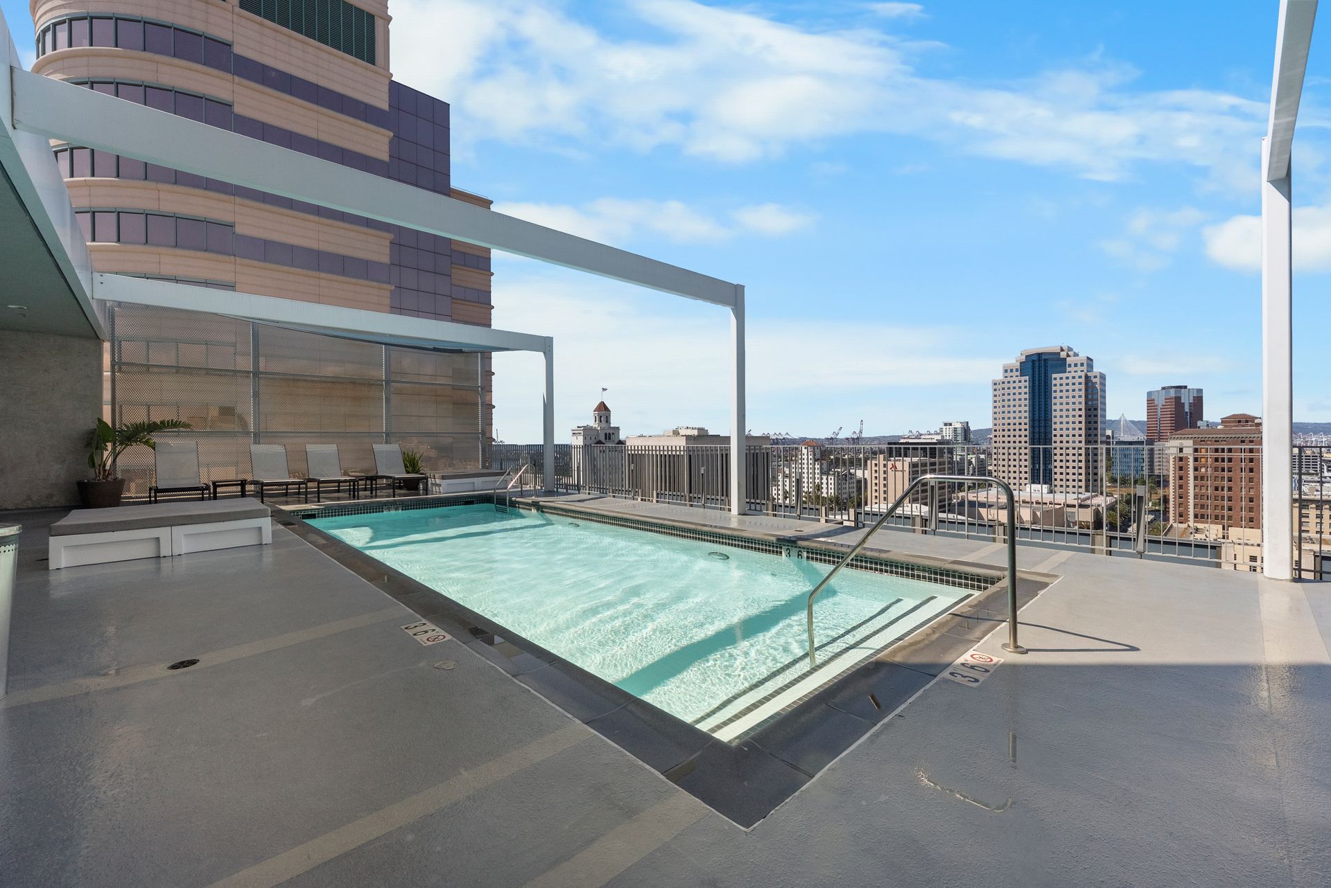 pool with lounge chairs