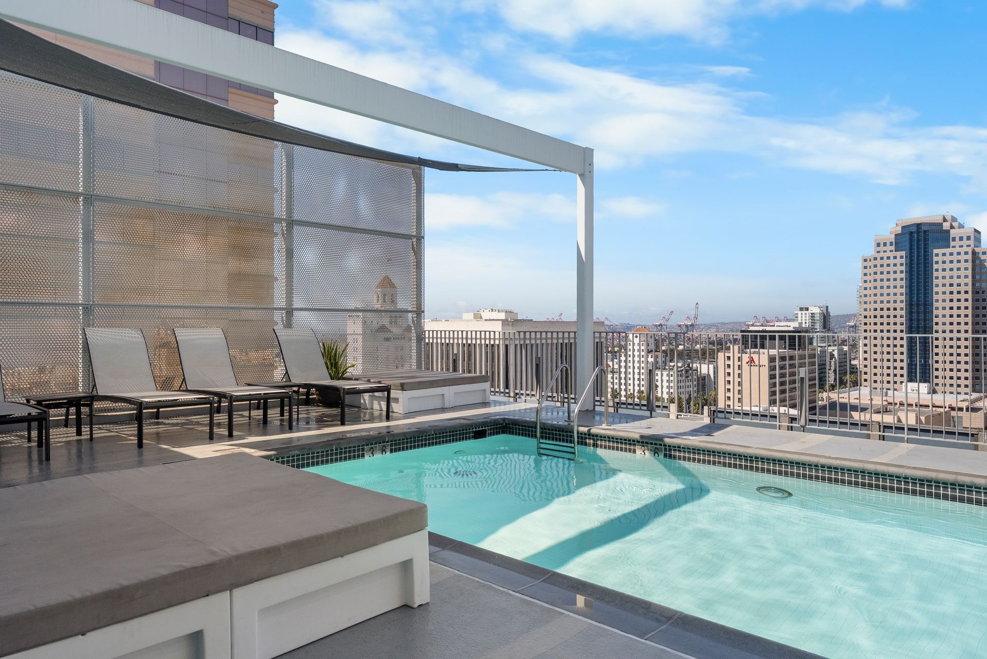 pool with lounge chairs