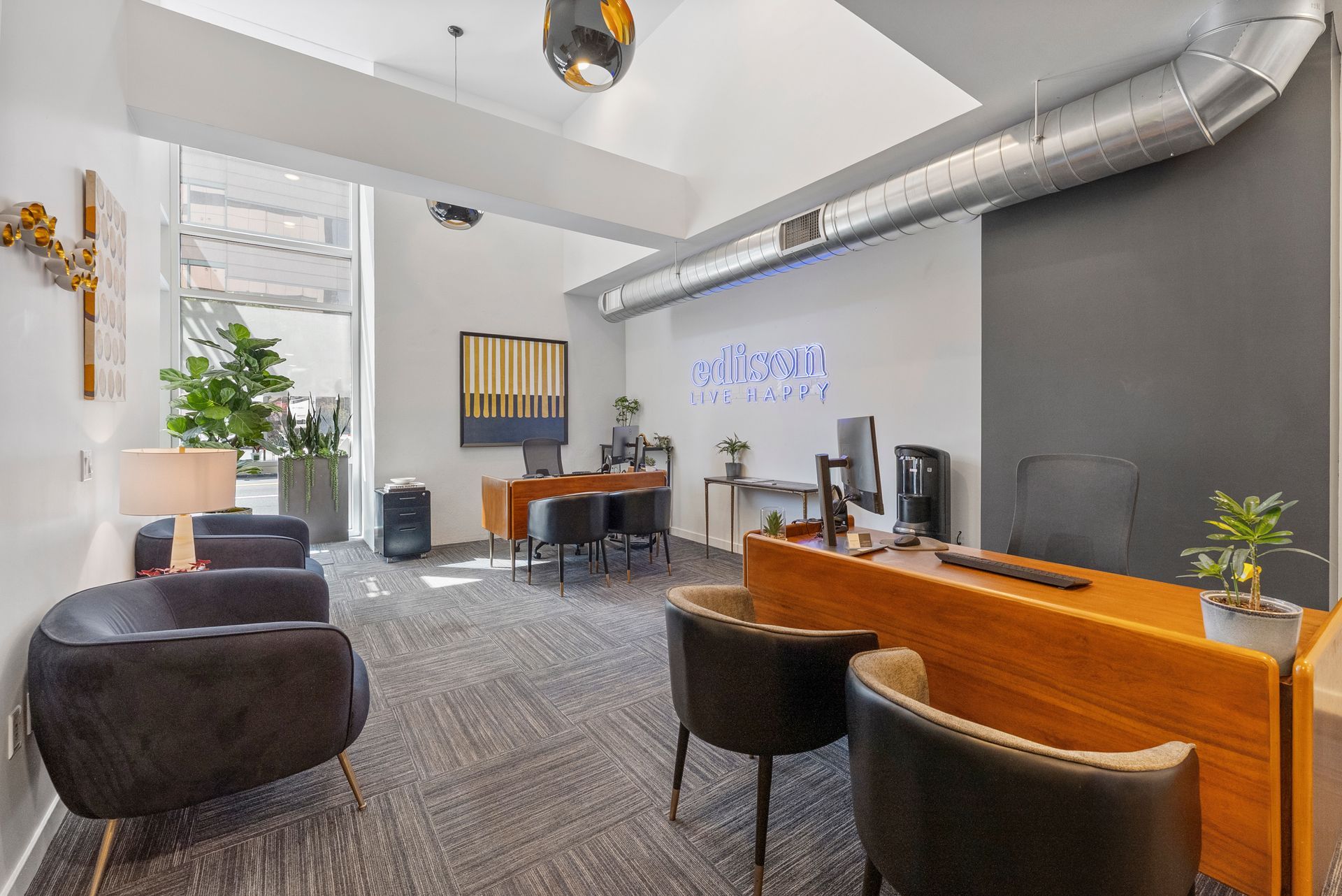leasing office with desks and chairs