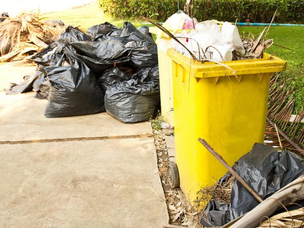 different garbages near the road
