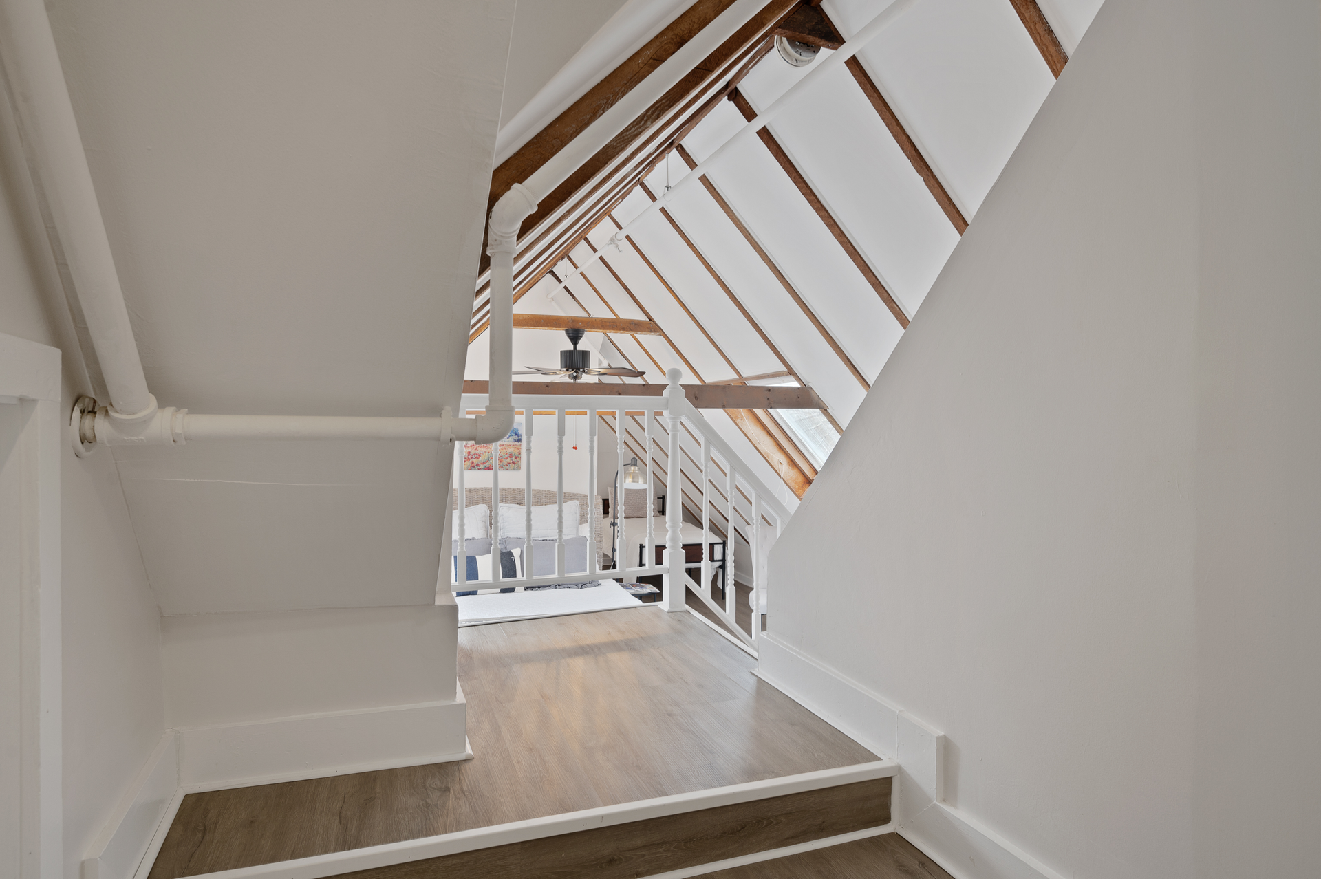 A staircase leading up to the second floor of a house