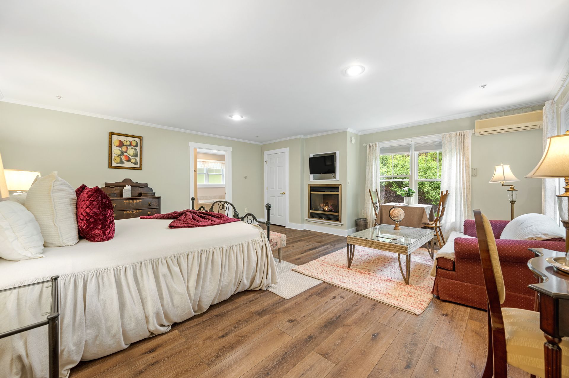 There is a large bed in the middle of the room.