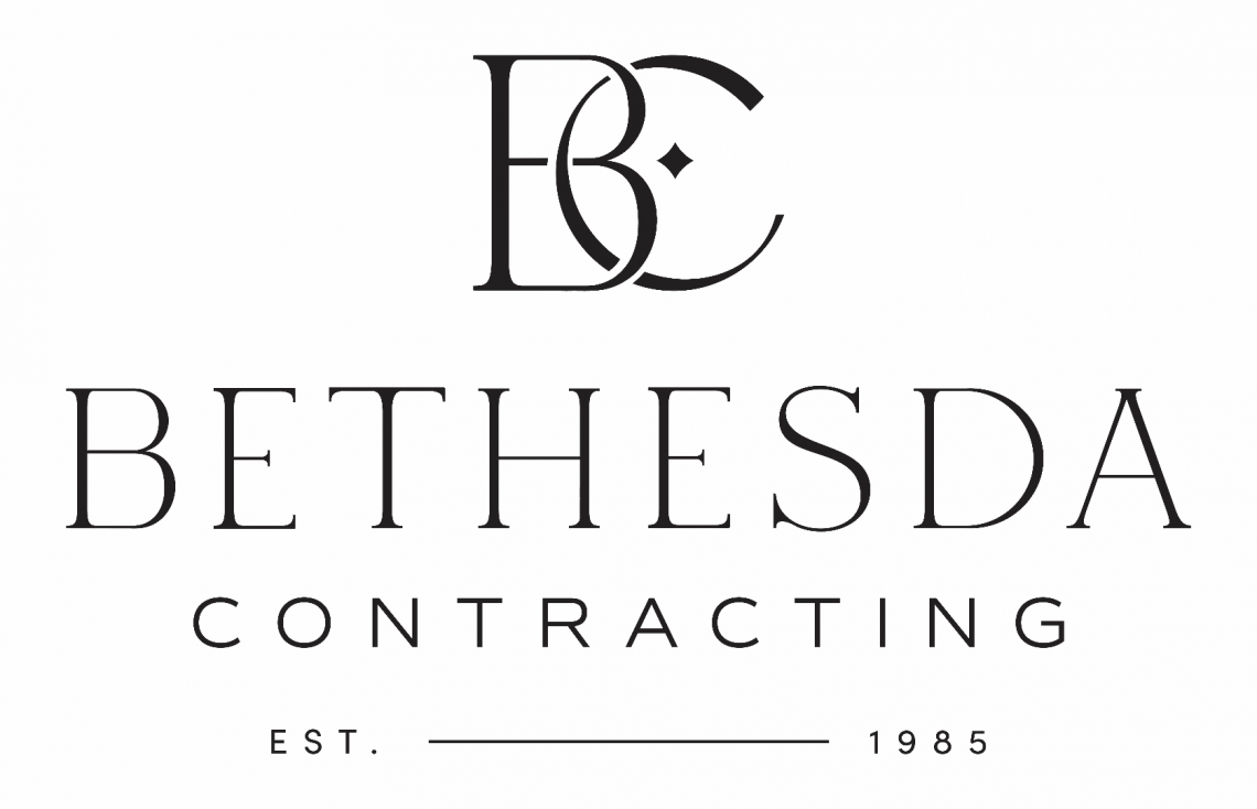 The logo for bethesda contracting is black and white.