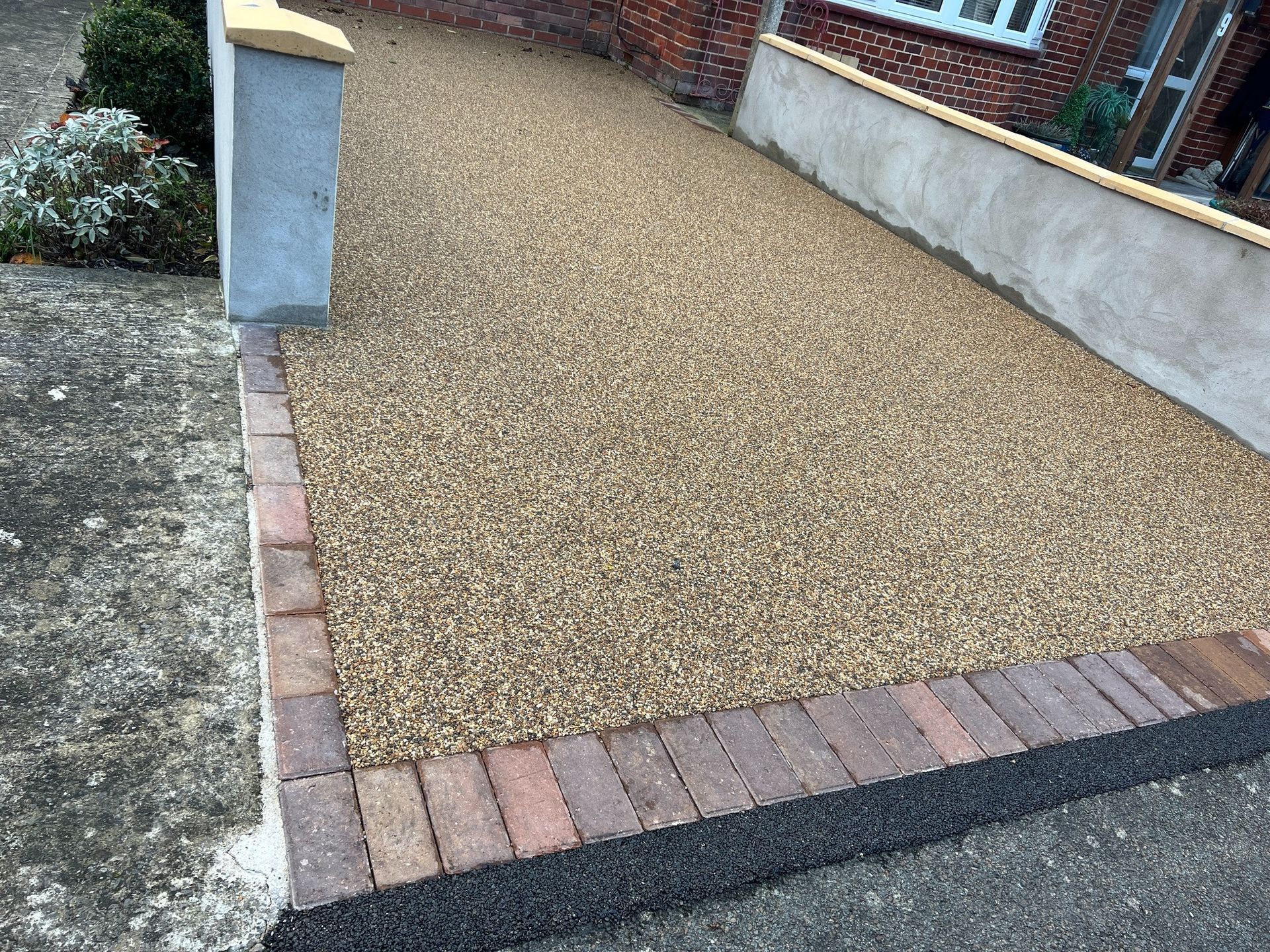 After our work on a resin driveway spread, view from the front.