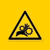 Yellow warning sign with black triangle and gears, indicating a machinery hazard