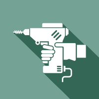 White drill icon on green background with long diagonal shadow