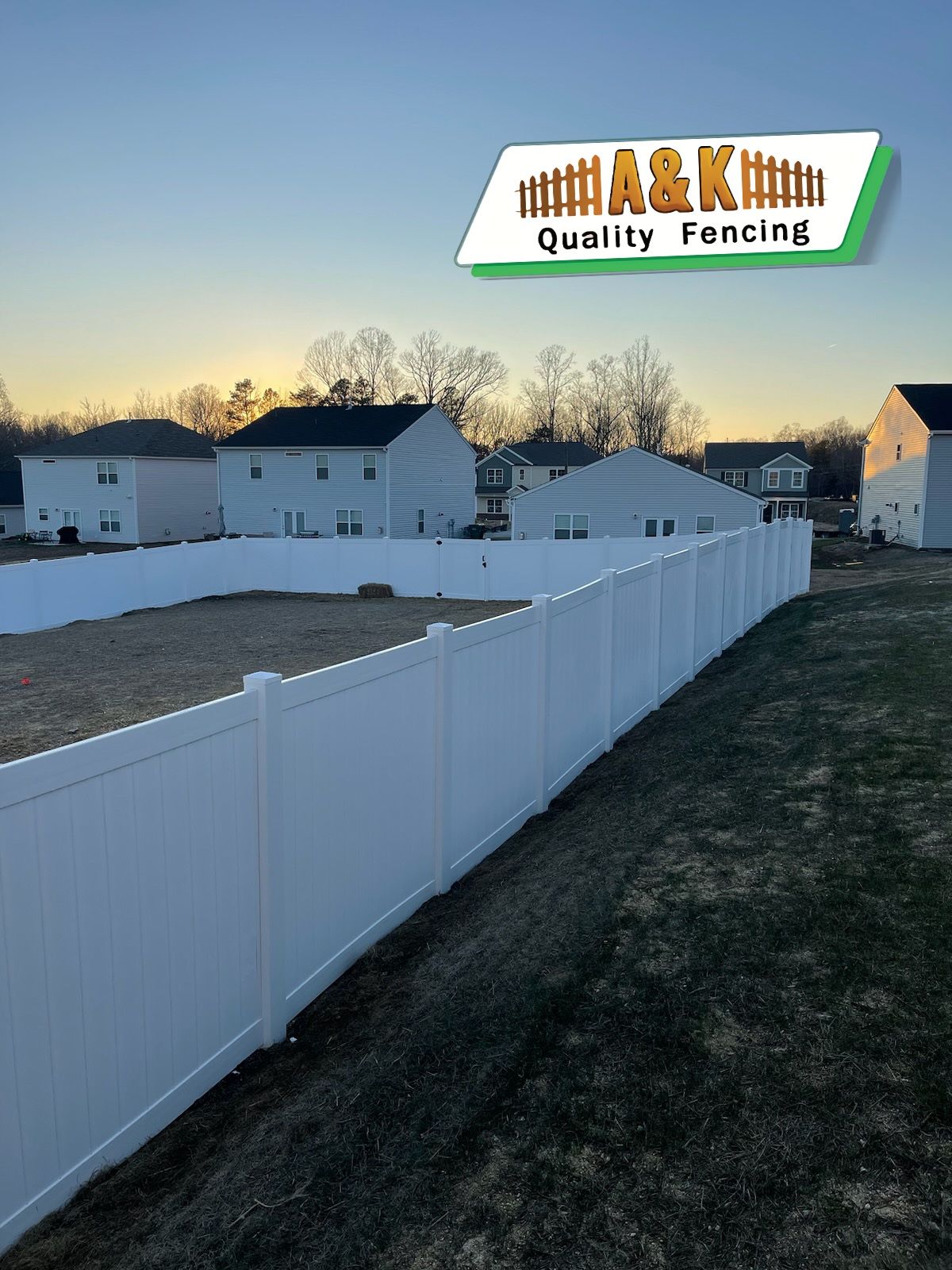 White vinyl fence in front of suburban houses at sunset, logo
