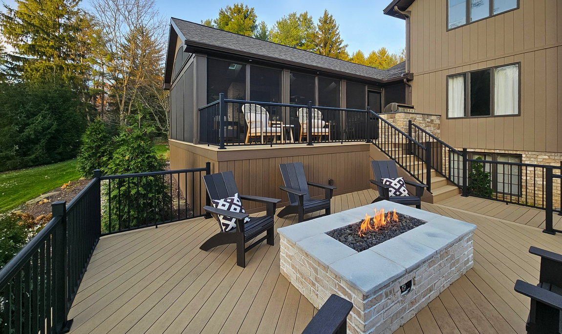 Multi-level composite deck with pergola and Illinois landscaping