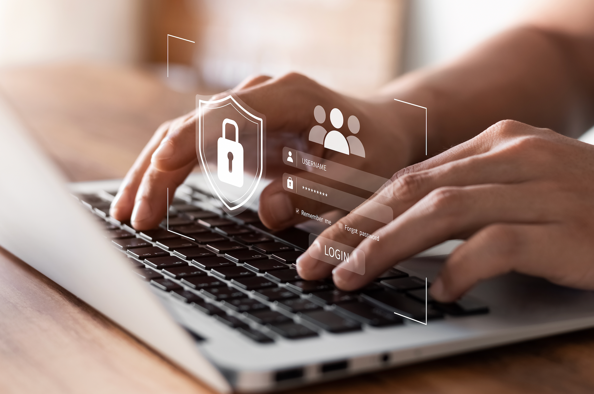 A person is typing on a laptop computer.