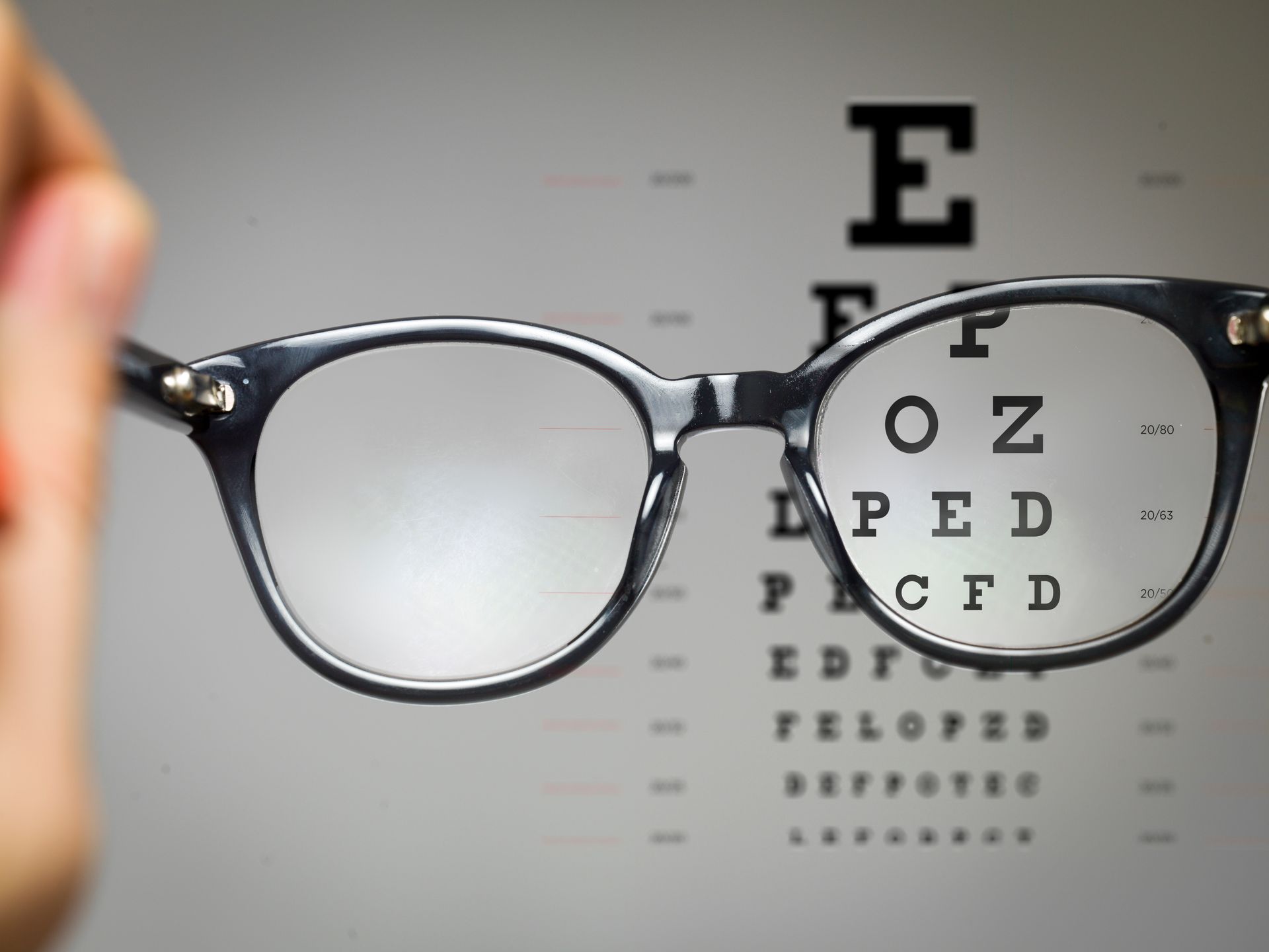 a POV of someone looking through one lens of eyeglasses with Myopia. a POV of someone looking through one lens of eyeglasses with Myopia.
