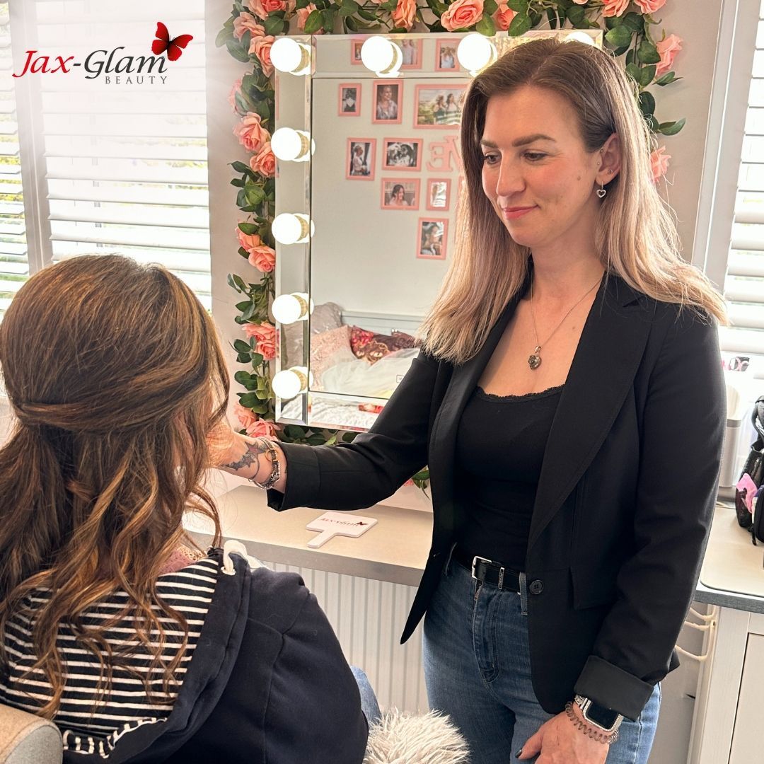 1-to-1 makeup lesson showing client applying makeup with guidance