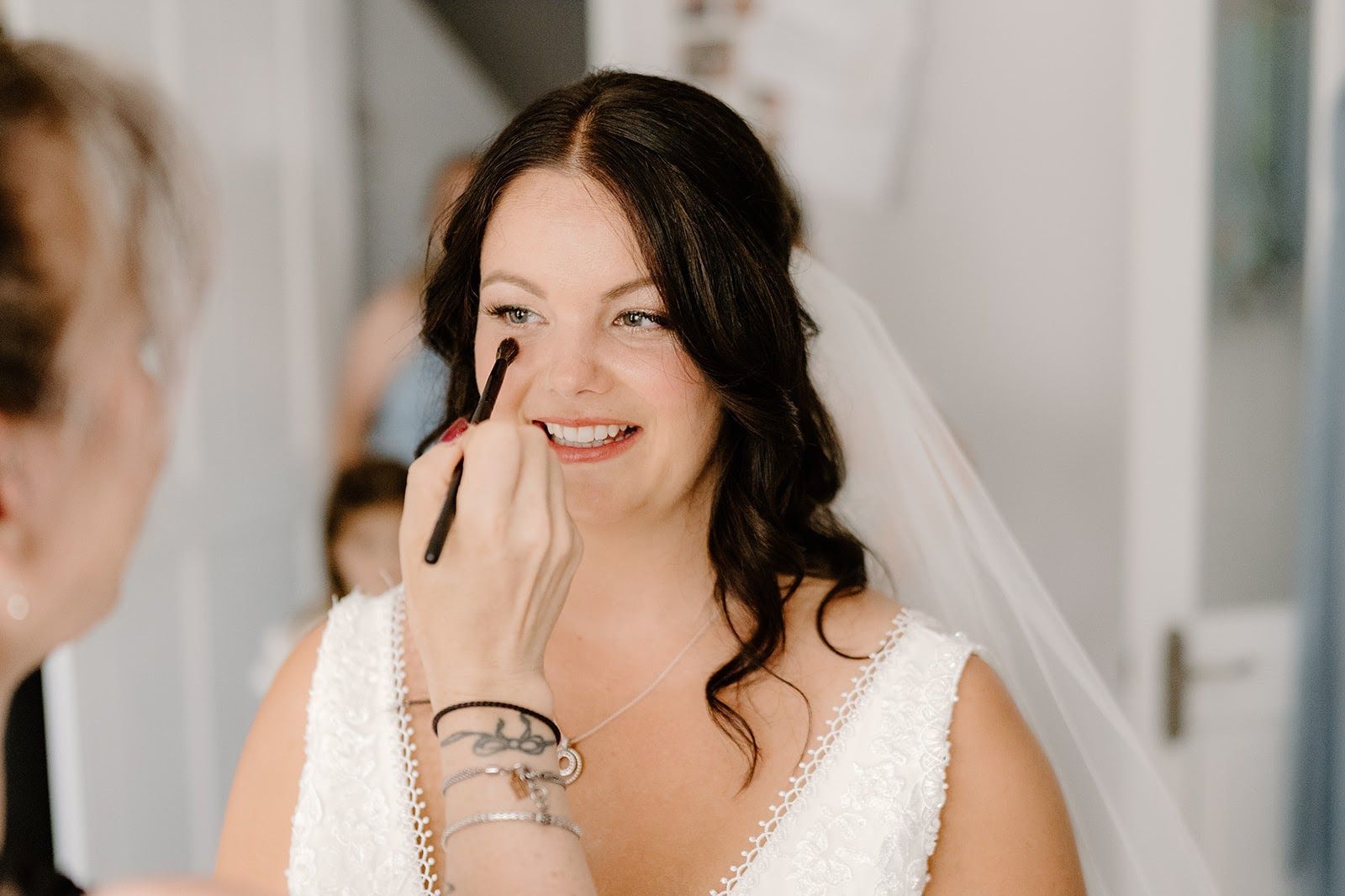 Bride preparing her skin with a gentle skincare routine for smooth, long-lasting wedding makeup