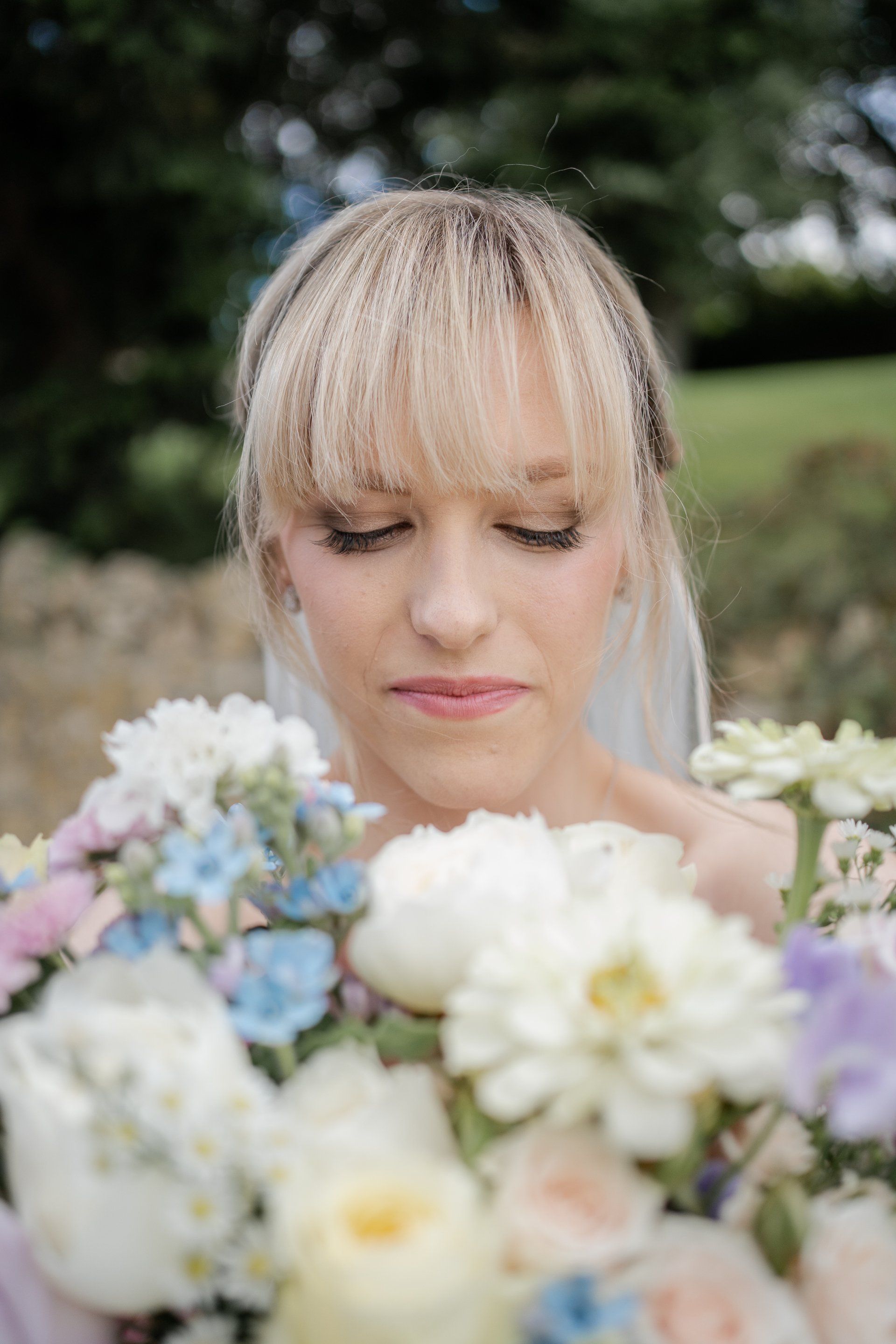 bridal hairstyle with pearl fringe and airbrush makeup by Jax-Glam Beauty wedding makeup artist Bristol