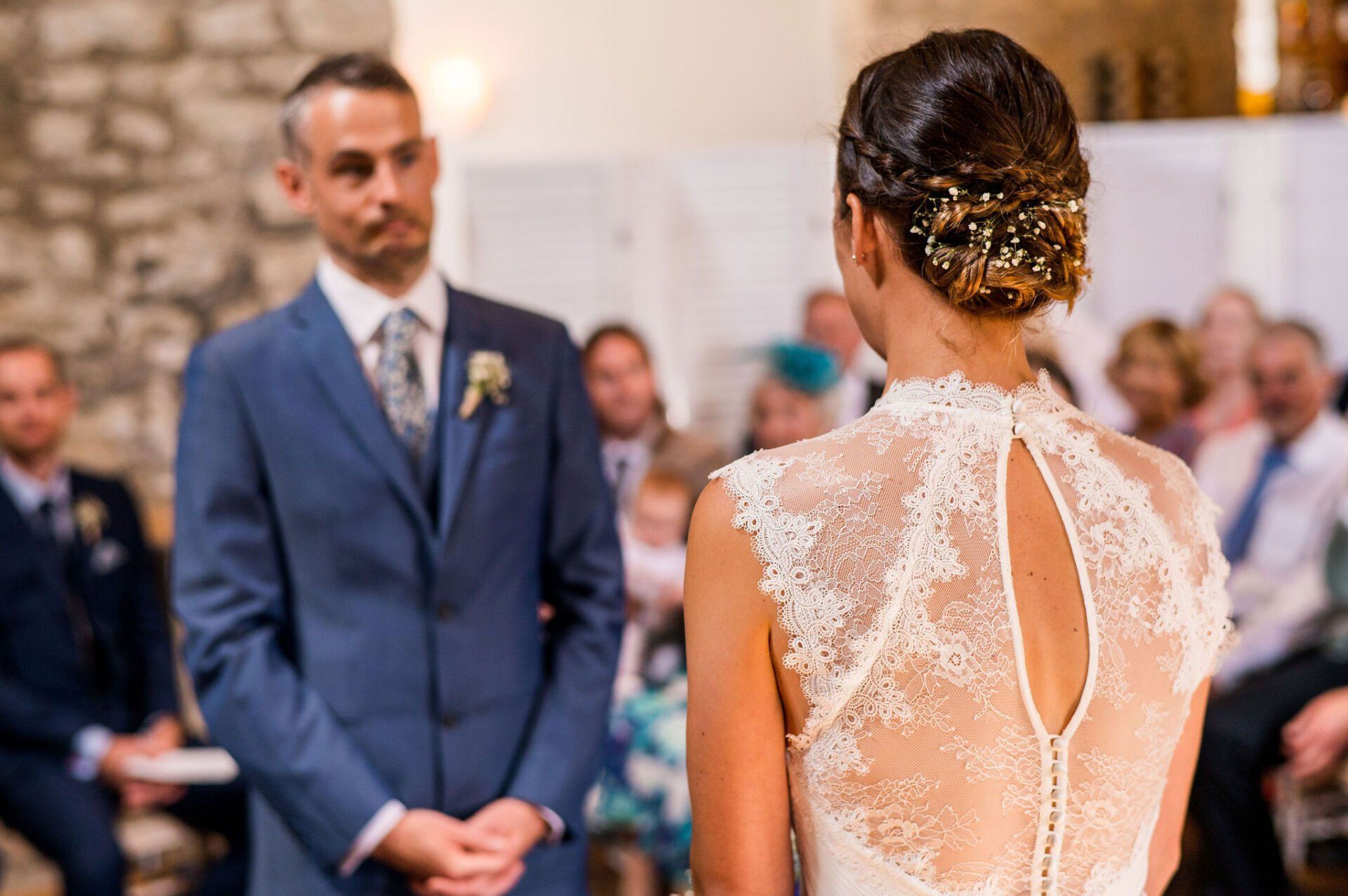 bride walking down aisle with braided bridal hairstyle by Jax-Glam Beauty Bristol