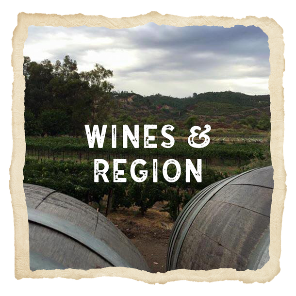 A picture of a vineyard with the words wines & region above it