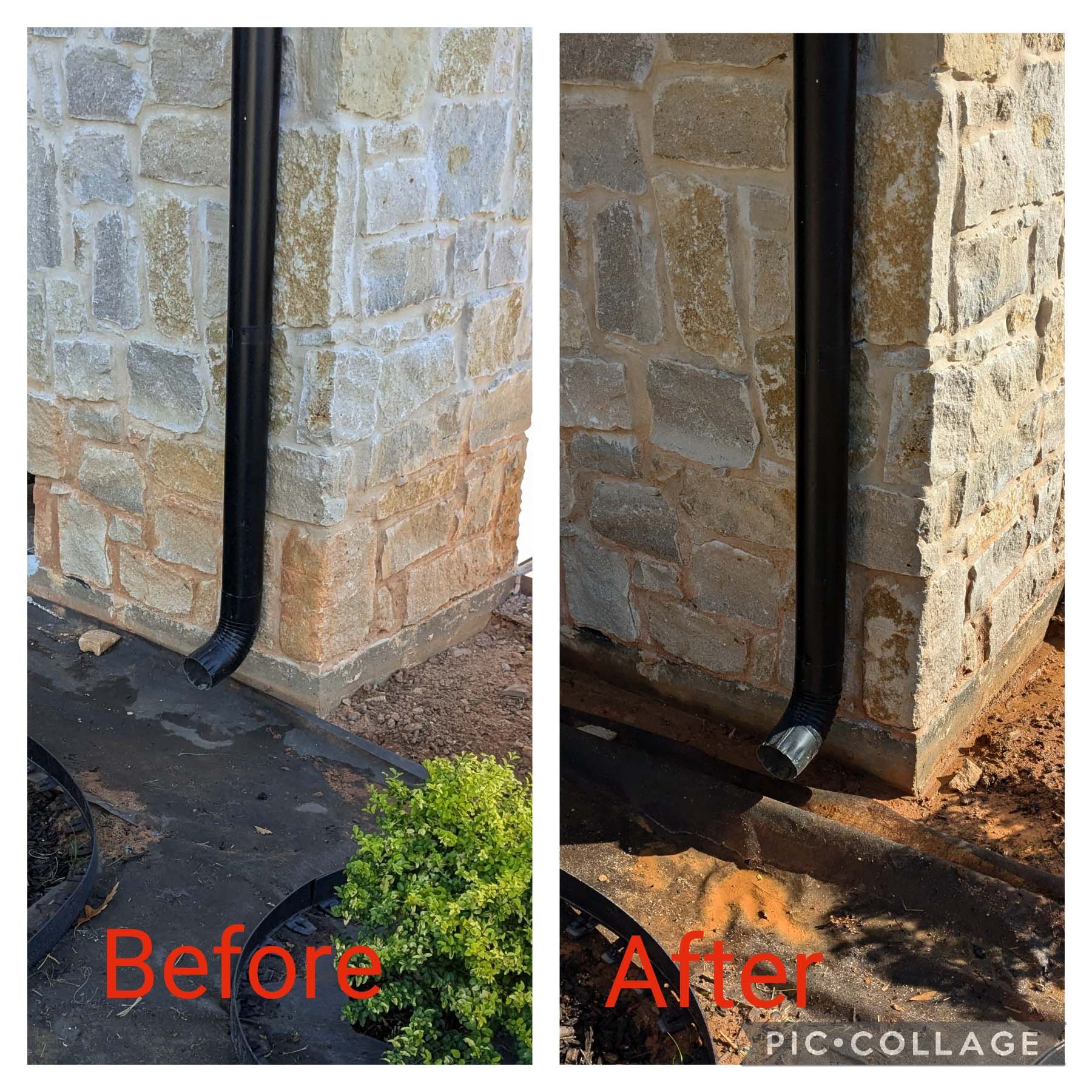 Side-by-side before and after of a stone wall downspout repair, with water staining removed.