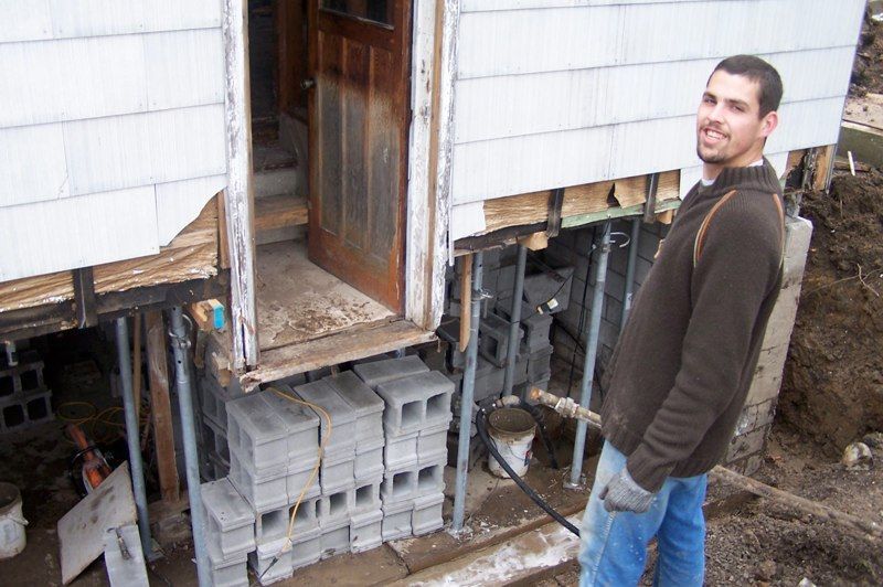 The Pro Seal Waterproofing team working on an exterior foundation repair job in the Niagara region.