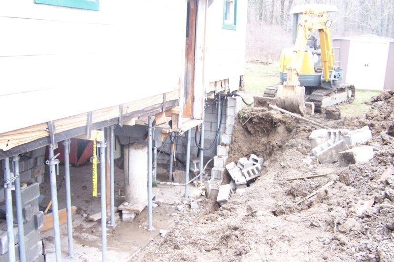 The Pro Seal Waterproofing team working on a basement foundation repair job in the Niagara region.