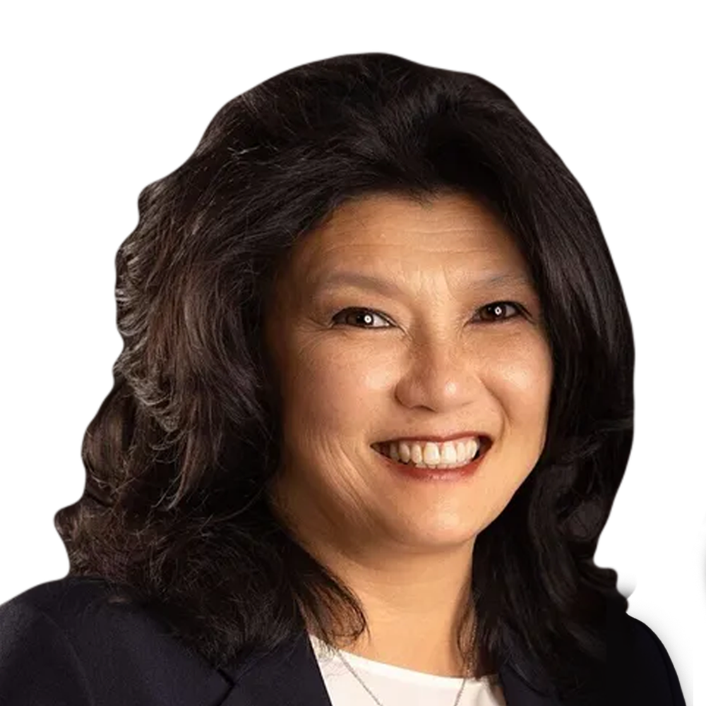 A woman with long dark hair is smiling and wearing a black jacket.